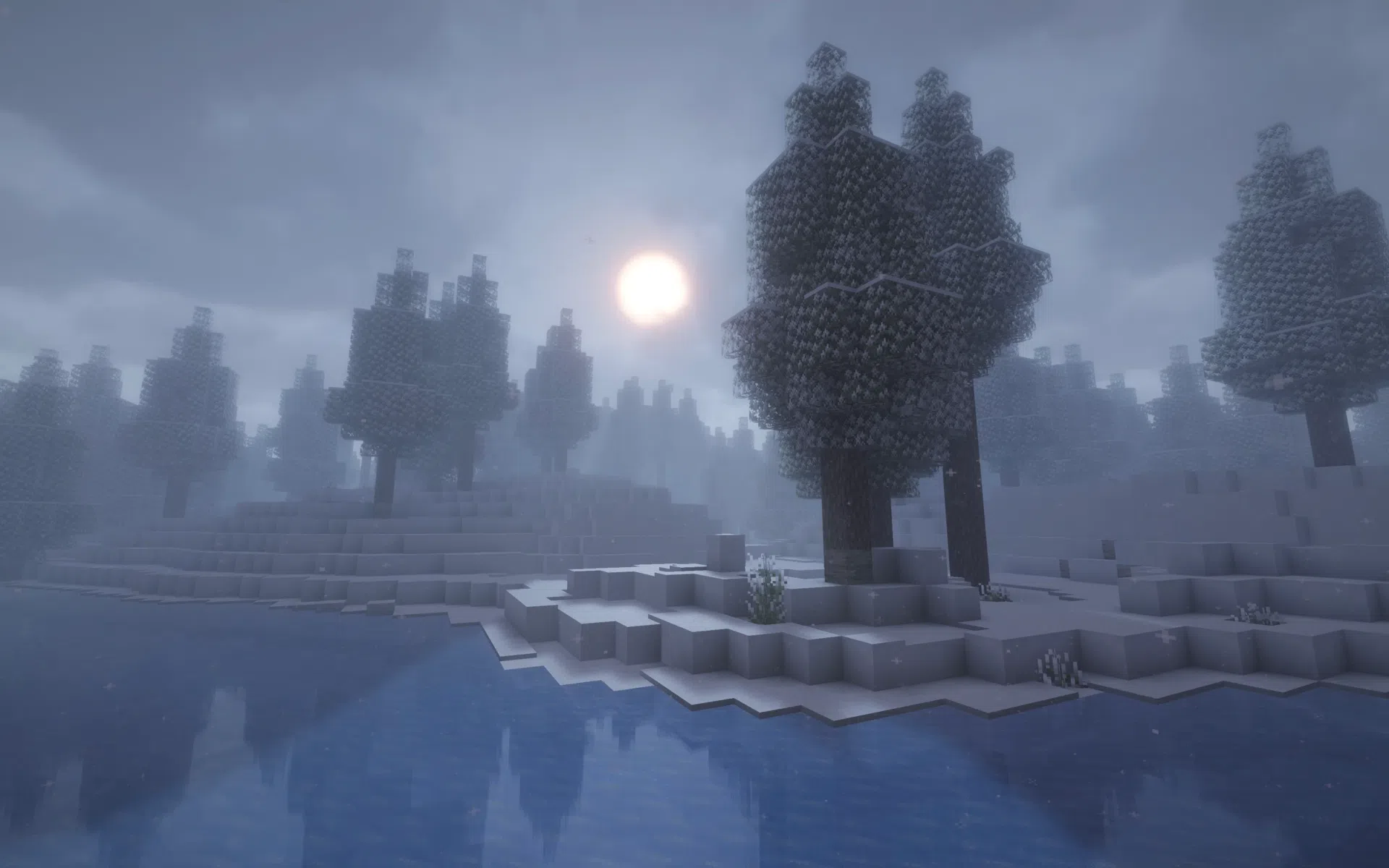 Snowy landscape with soft fog and gentle snowfall
